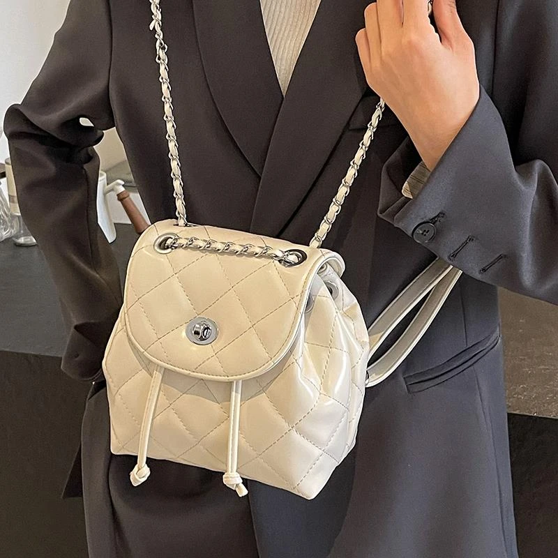 范哲萨双肩包女时尚2025银色高级感小众设计链条包小型女士白色背