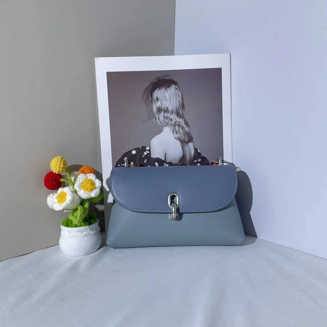 （样品微瑕）70701190牛仔蓝色XS女士单肩斜挎包-杨灬