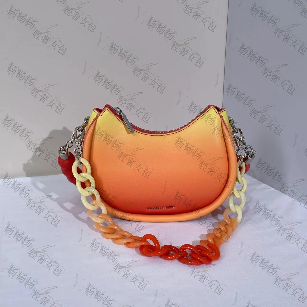 20781846浅橘红色S单肩斜挎腋下新月包-杨灬