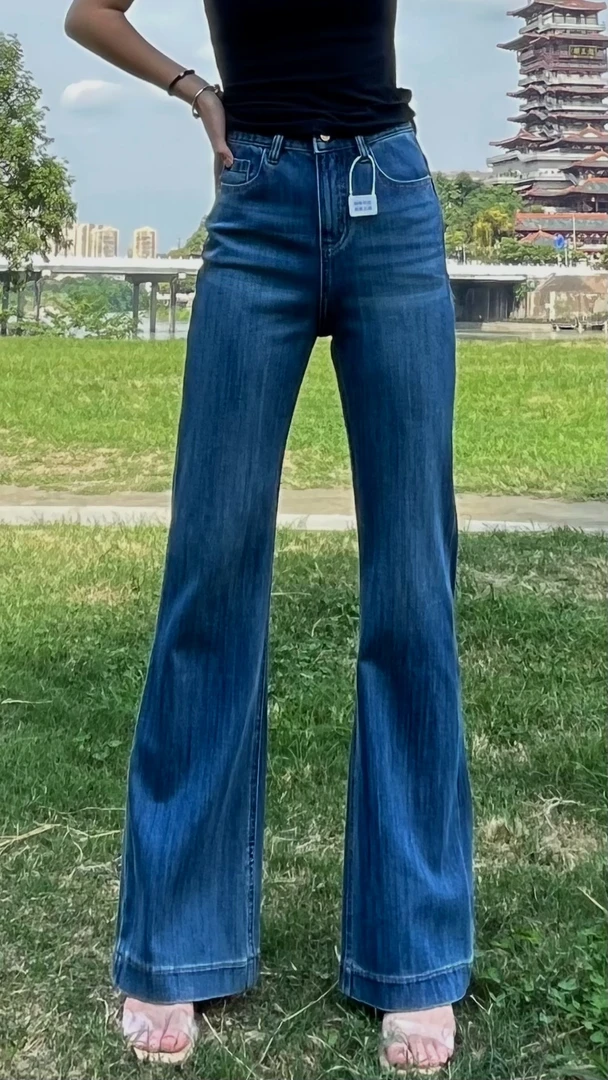 W2024秋季新款深海蓝中高腰直筒微喇牛仔裤女显瘦显高四面弹