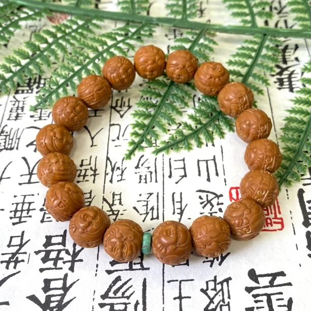 财富人生猴头满雕刻手串