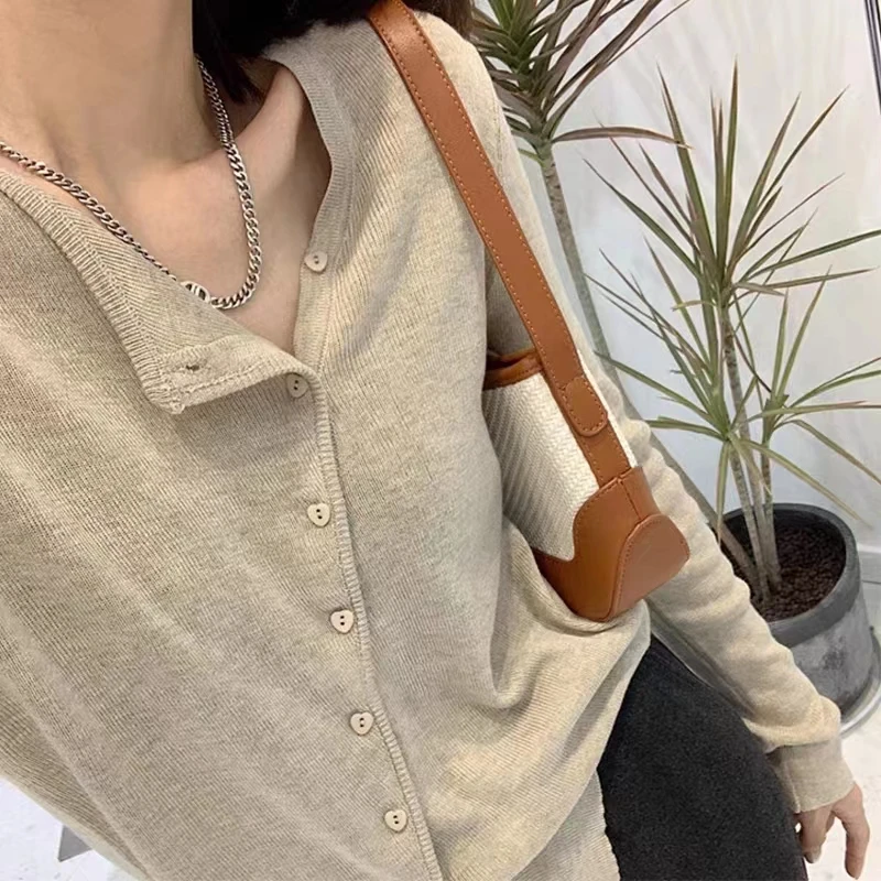 设计感斜扣不对称针织开衫女2023秋季新款慵懒风长袖显瘦外套上衣