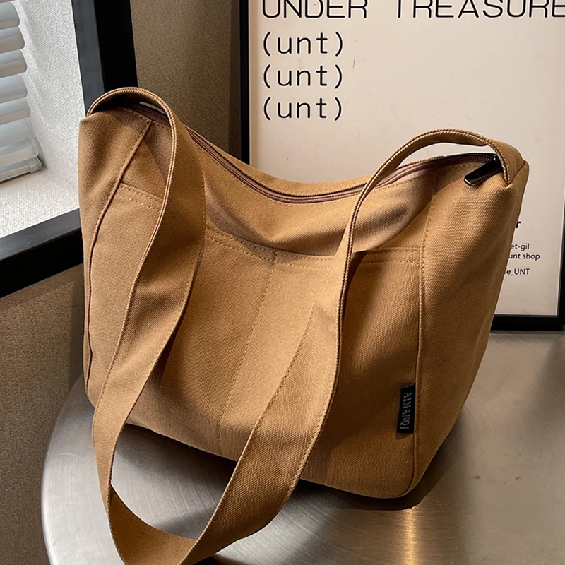 帆布包包女大容量2024新款时尚夏季百搭宽带斜挎包女士流行水桶包