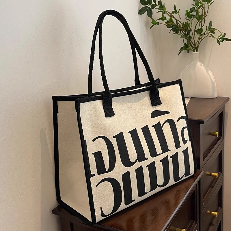 韩版时尚托特包女2025夏季新款撞色百搭帆布包大容量休闲单肩大包