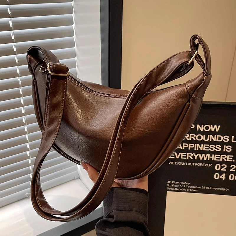 包包女斜挎包2025新款春夏款大容量小众设计高级感复古单肩饺子包