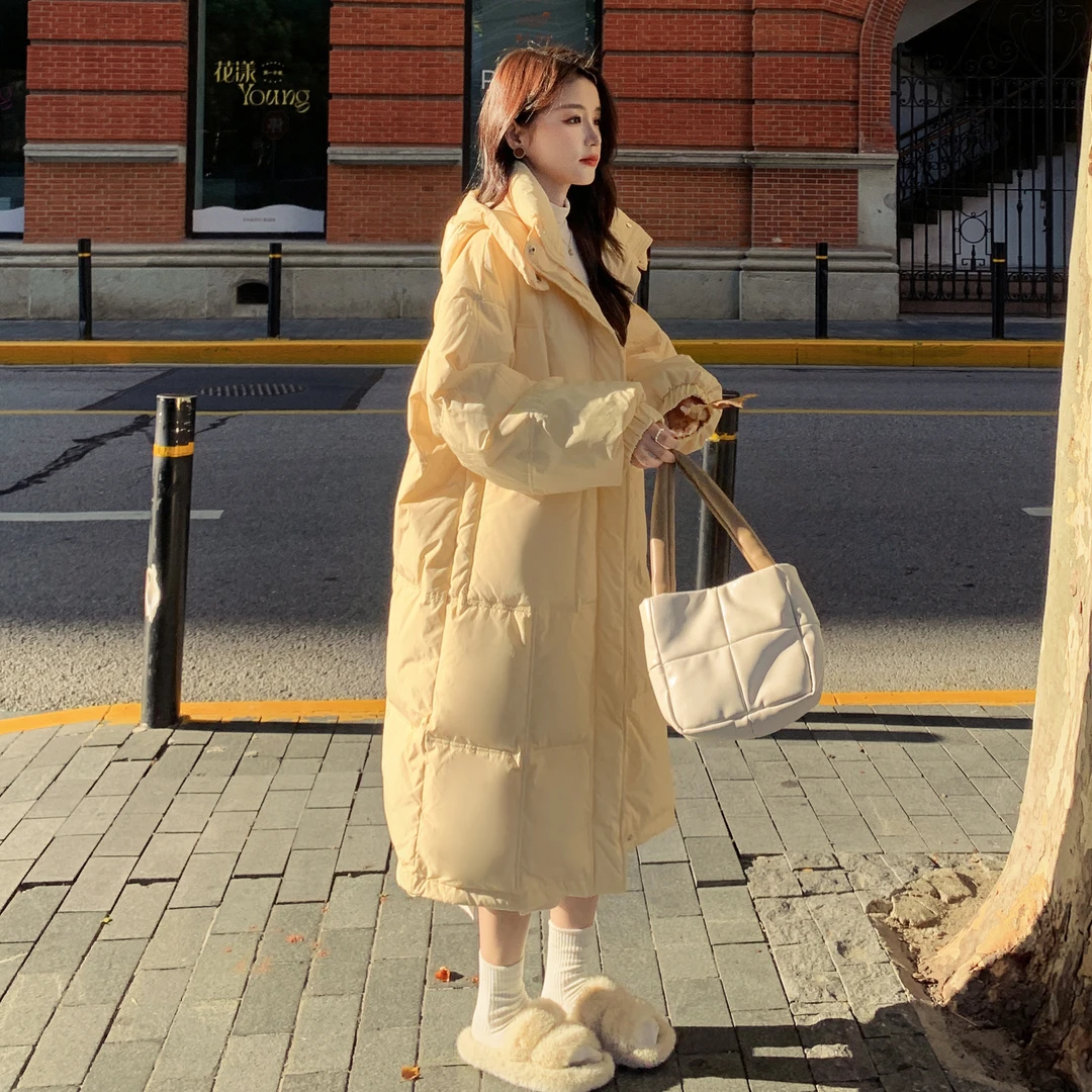 YAYA鸭鸭白鸭绒2024羽绒服新款奶fufu淡黄色羽绒女中长款23季连帽