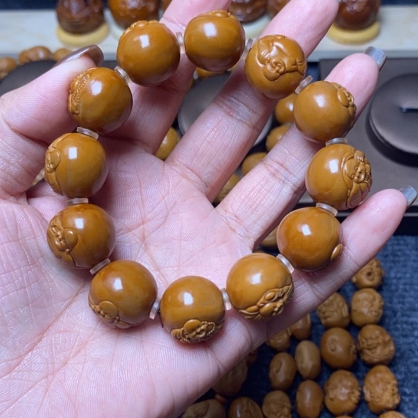【闪购商品】橄榄核手串辞*)