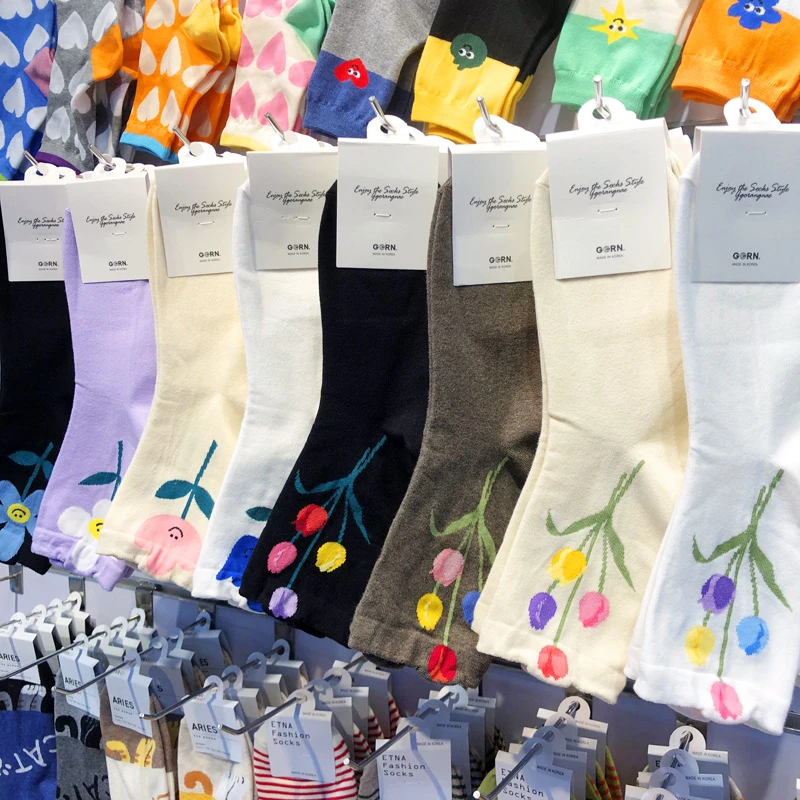 韩国进口东大门女袜泫雅风花朵笑脸女中筒时尚郁金香百搭棉袜四季
