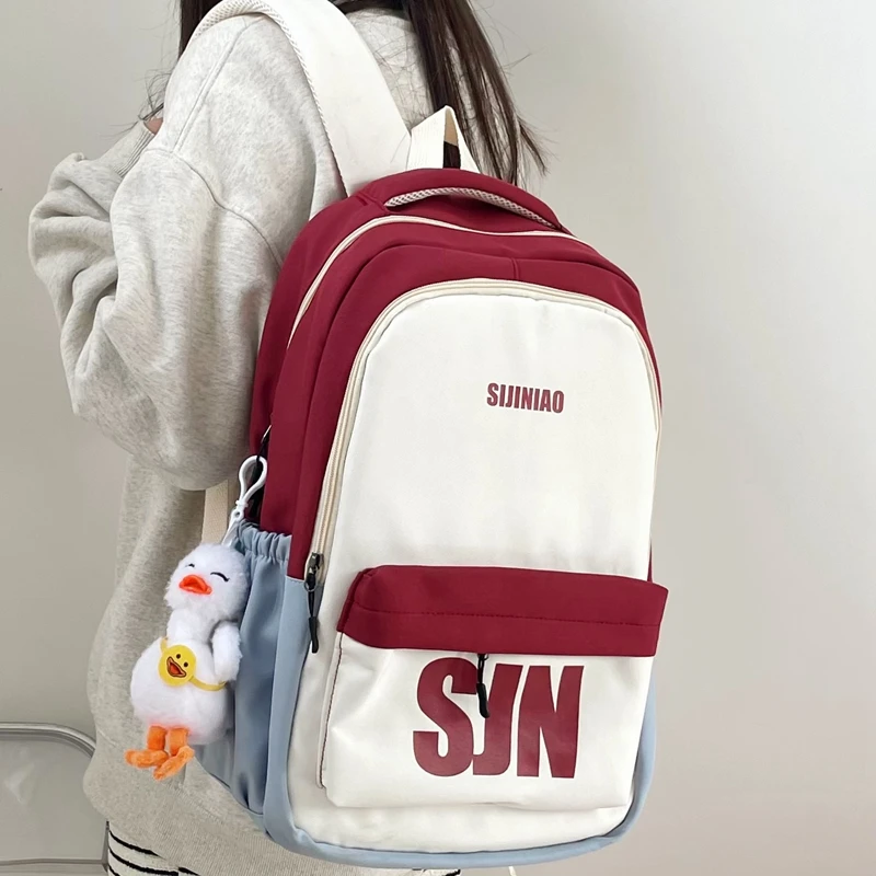 双肩包女大容量简约百搭护肩小学生初中高中大学生书包男电脑背包