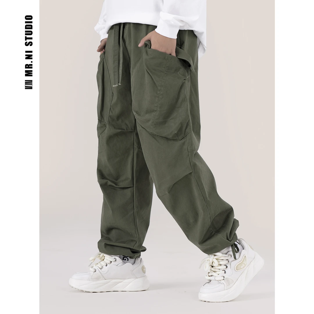 MR.NI/倪先生“率性出场”立体剪裁膝盖褶皱宽松工装大口袋直筒长裤