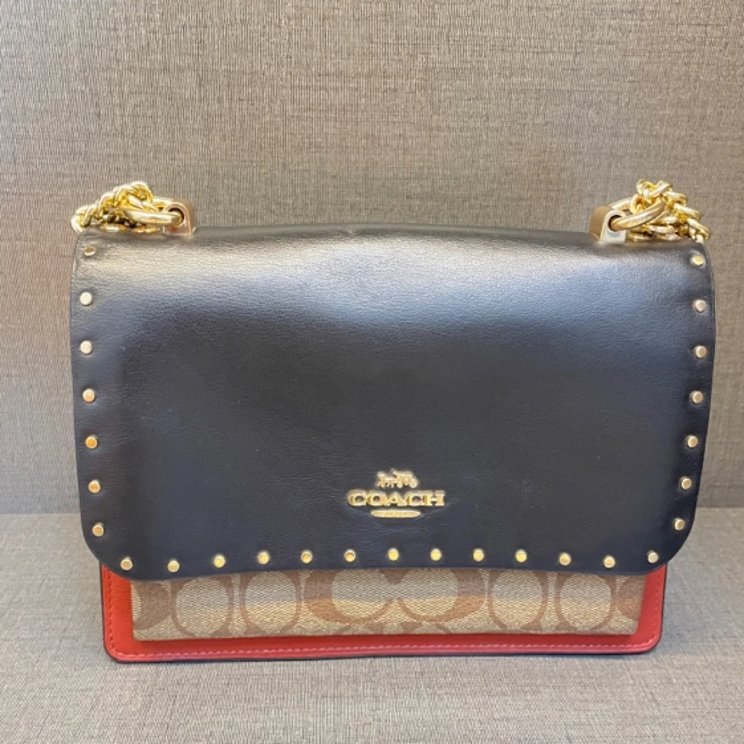 95新 COACH/蔻驰 95新蔻驰铆钉风琴包