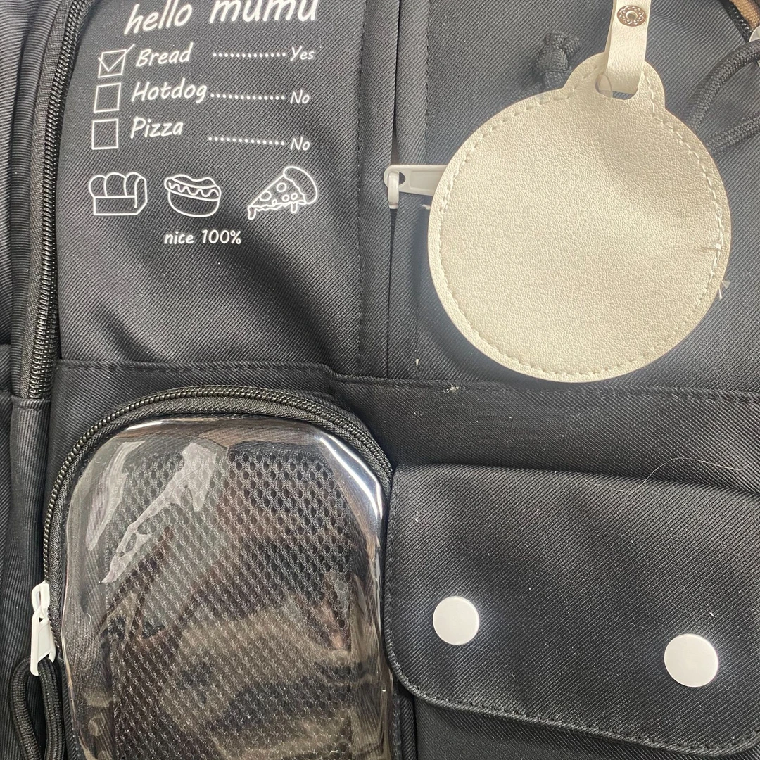 黑色沐沐男宝学生书包颜色随机发