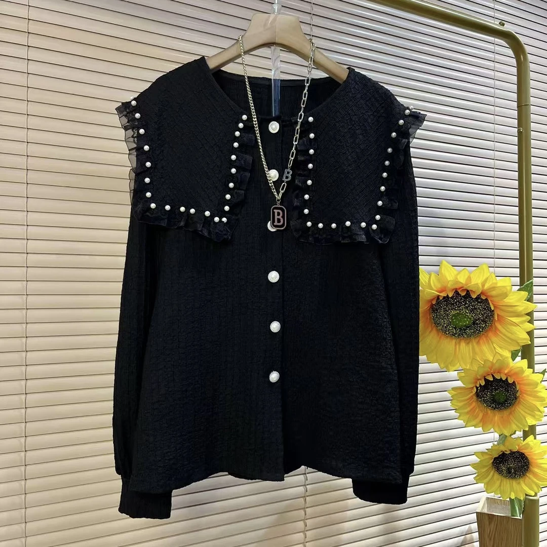 Y欧货时尚状况重工娃娃领减龄显瘦女人衫