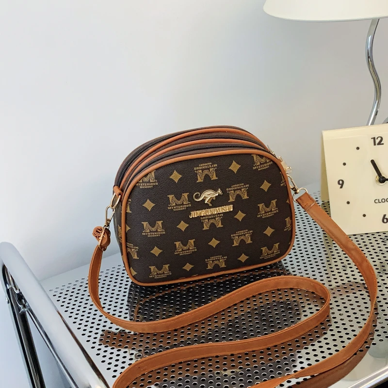 2025新款韩版个性印花女士时尚大容量斜挎包小圆包单肩手机包