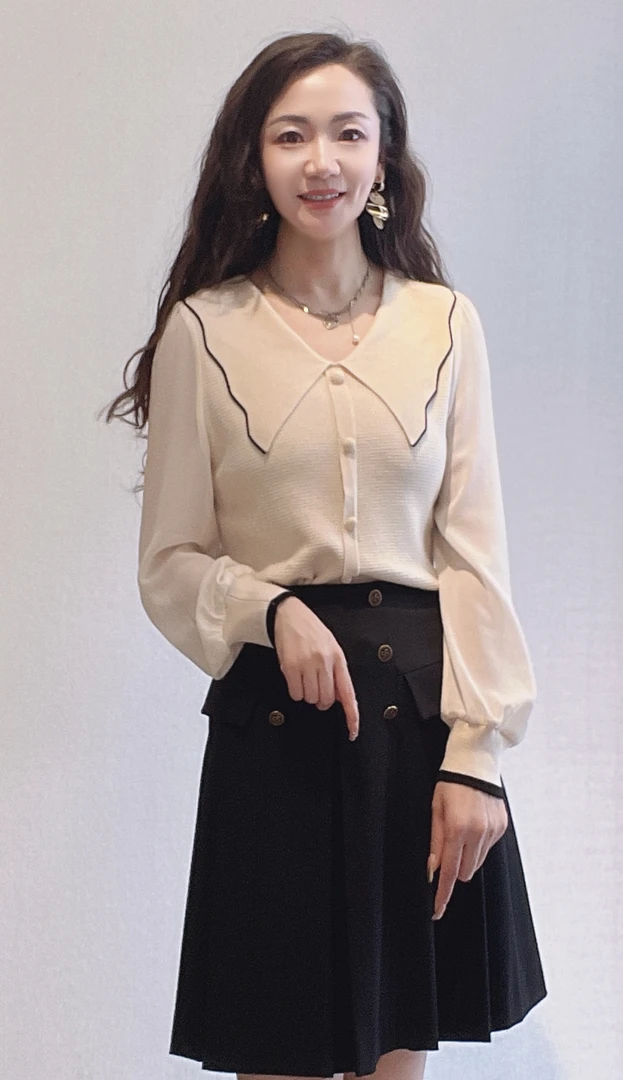 24313073新品减龄拼色针织衫