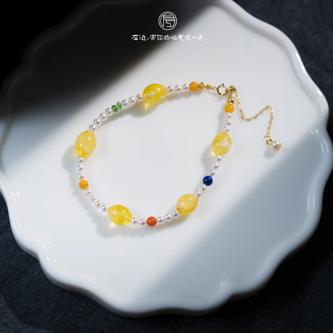 左边婷姐天然琥珀金姣蜜淡水珍珠多宝设计精致文玩风手链（B991）