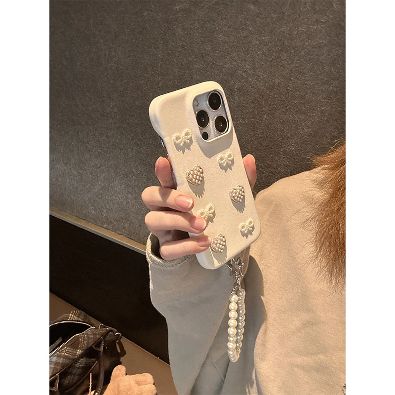 新款皮质高级感立体珍珠蝴蝶结链条手机壳适用苹果15/14/promax