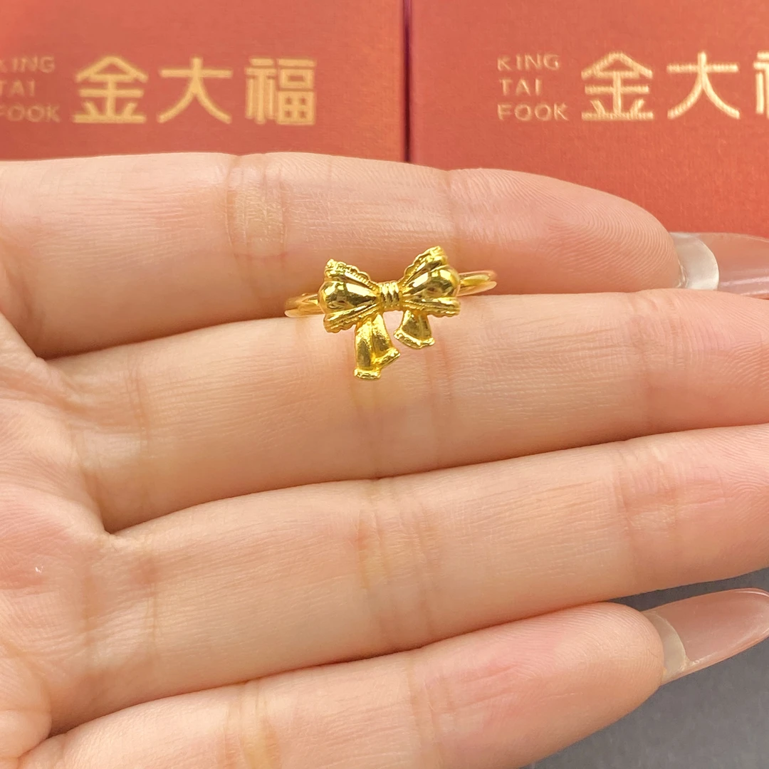 金大福足金999黄金在逃公主蝴蝶结戒指圈口可调节3.62g