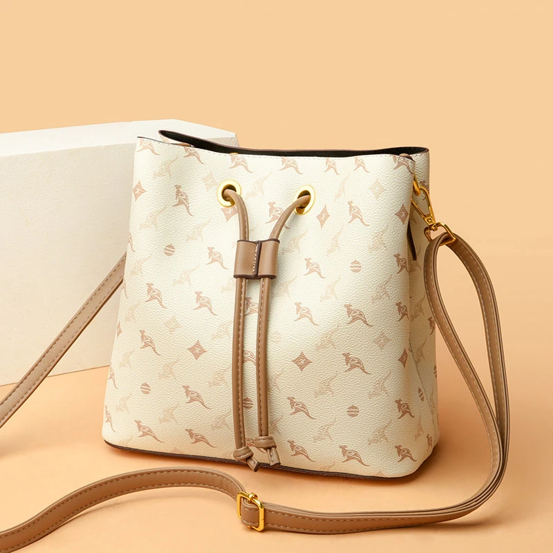 米琦袋鼠包包女水桶包2025新款大容量时尚百搭中年软皮单肩手提包