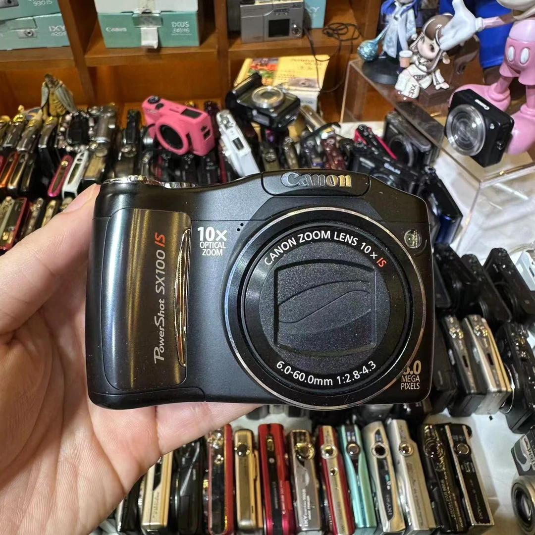 9新 Canon/佳能 佳能SX100 800W像素 10倍变焦 配内存卡和读卡器