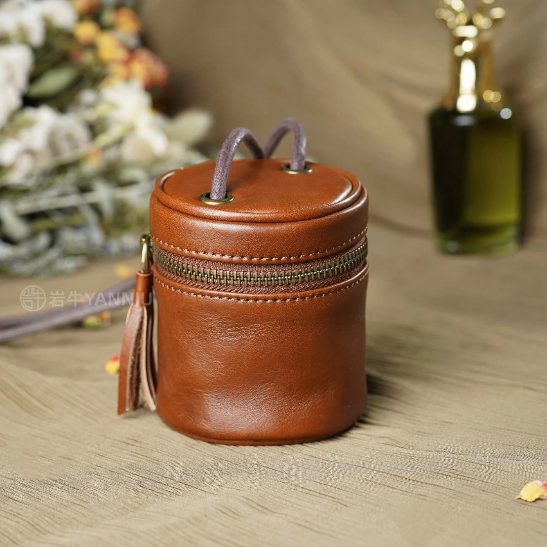 岩牛抽绳零钱包时尚女士真皮多功能小众便携圆形圆筒单肩斜跨小包