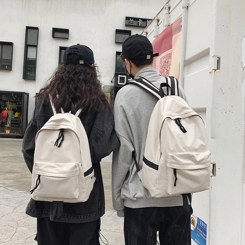 2022新款情侣书包大学生高中生初中生双肩包韩版纯色时尚背包