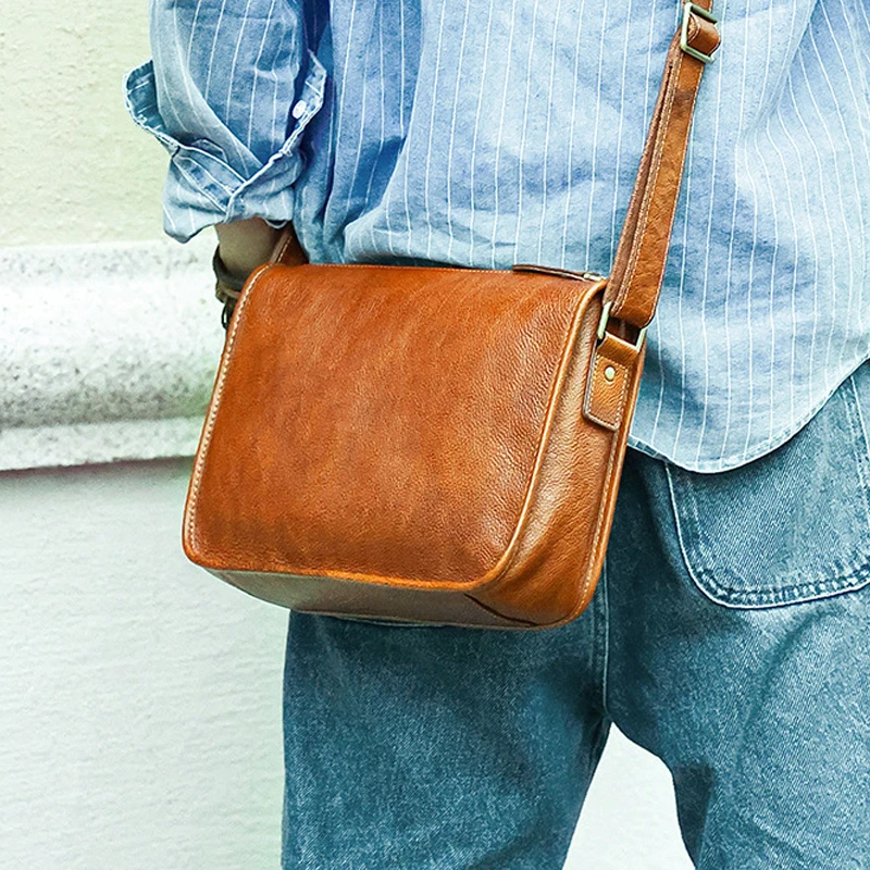 2024新款头层牛皮潮男帅酷INS软皮真皮休闲大容量男单肩包斜挎包