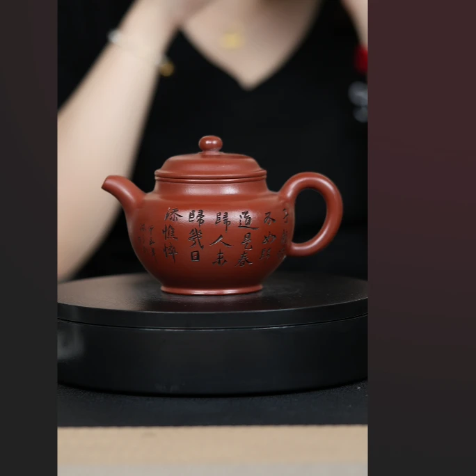 323 大红袍刻绘掇只壶