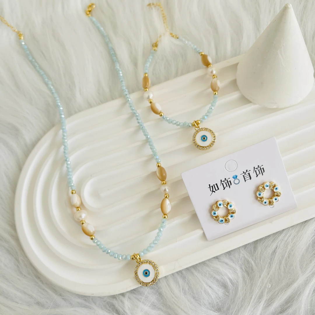 钛钢仿水晶项链 如饰 圆形眼睛吊坠蓝色仿水晶链夏天款三件套