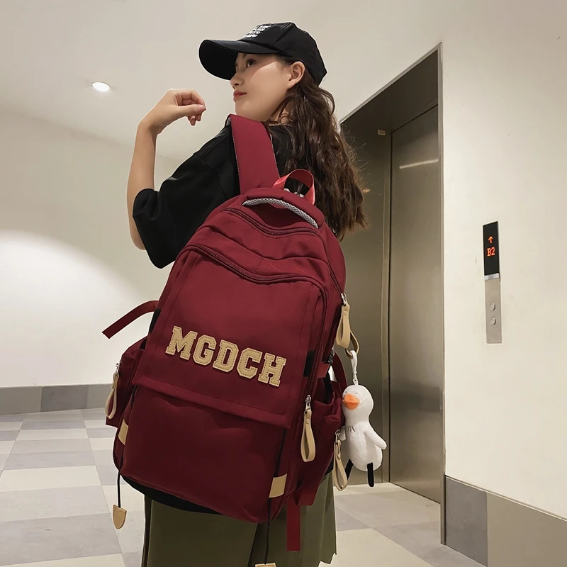 双肩包男生大学生新款潮流大容量背包轻便简约初中生高中生书包女