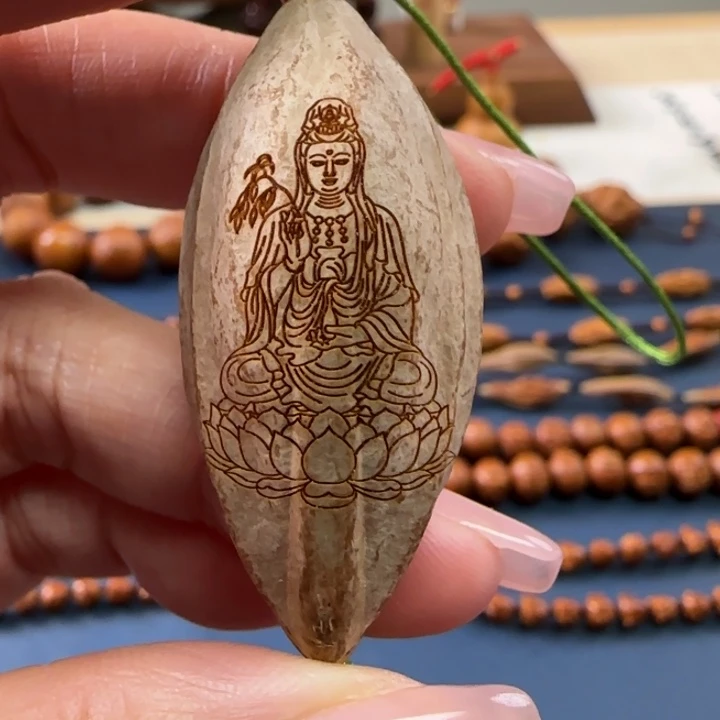 橄榄核核雕观音单子