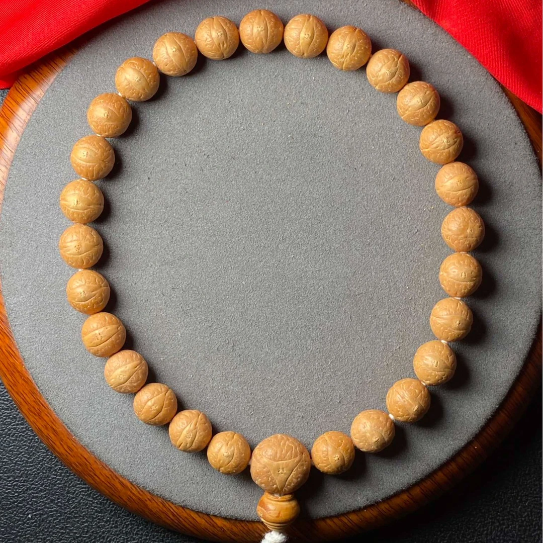 尼泊尔2025年新籽12mm凤眼菩提27颗小手持正圆无漏眼黄皮