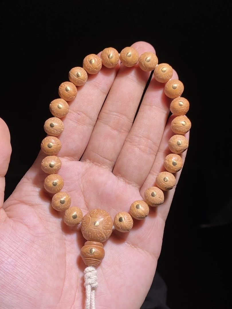 尼泊尔10mm小凤眼菩提手串精工镶嵌铜钉黄皮籽