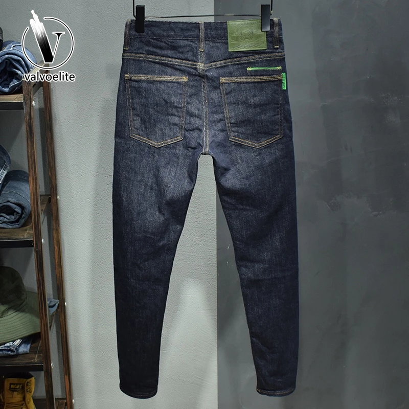 VALVOELITE深蓝水洗牛仔裤男修身小脚长裤秋冬新款刺绣高端裤子