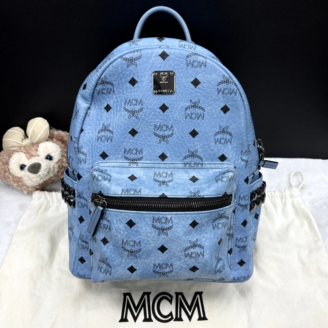 95新 MCM  XM/晴空蓝经典老花时尚铆钉小号双肩包/BB10730095
