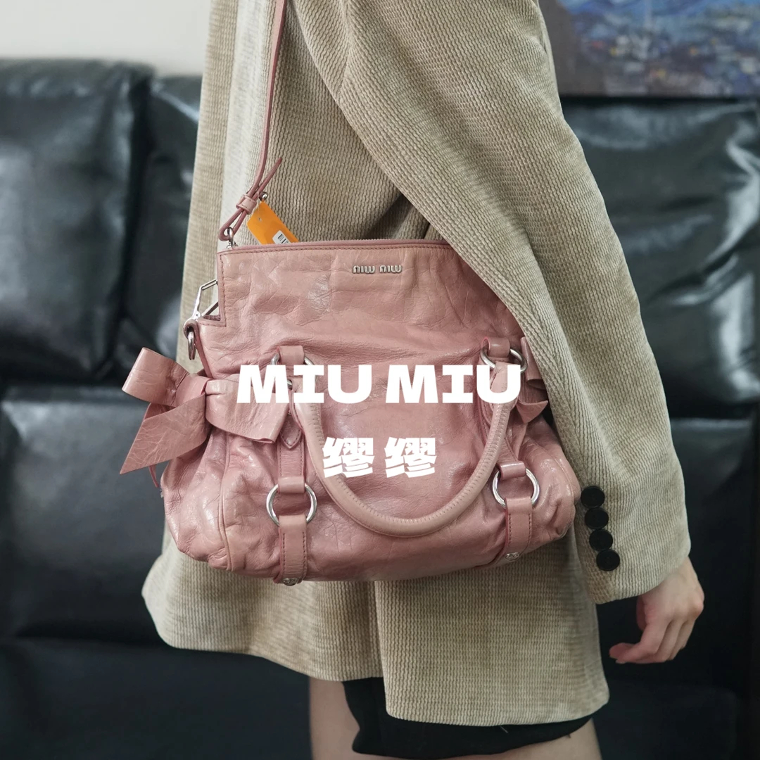 95新 MIU MIU/缪缪 miumiu/粉色斜挎包/HB10815579/5579