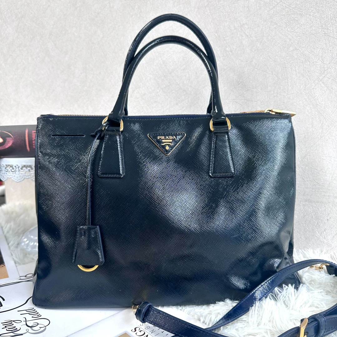 95新 Prada/普拉达 XM/深海蓝杀手金标手提斜挎包/THXS09624014