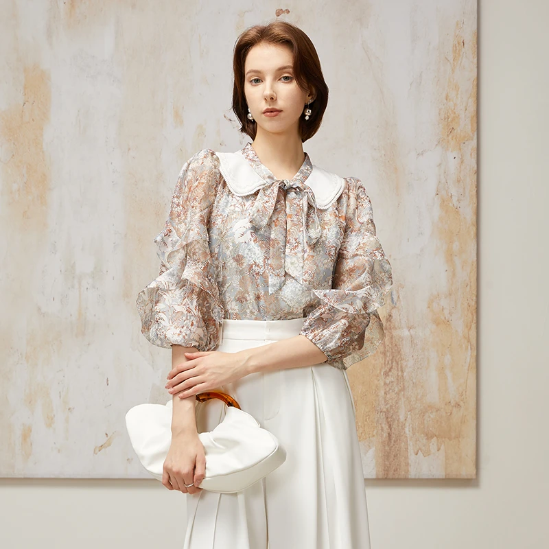 【粉丝专享】恩曼琳春季绣花娃娃领系带荷叶边印花雪纺衫EANEAH34