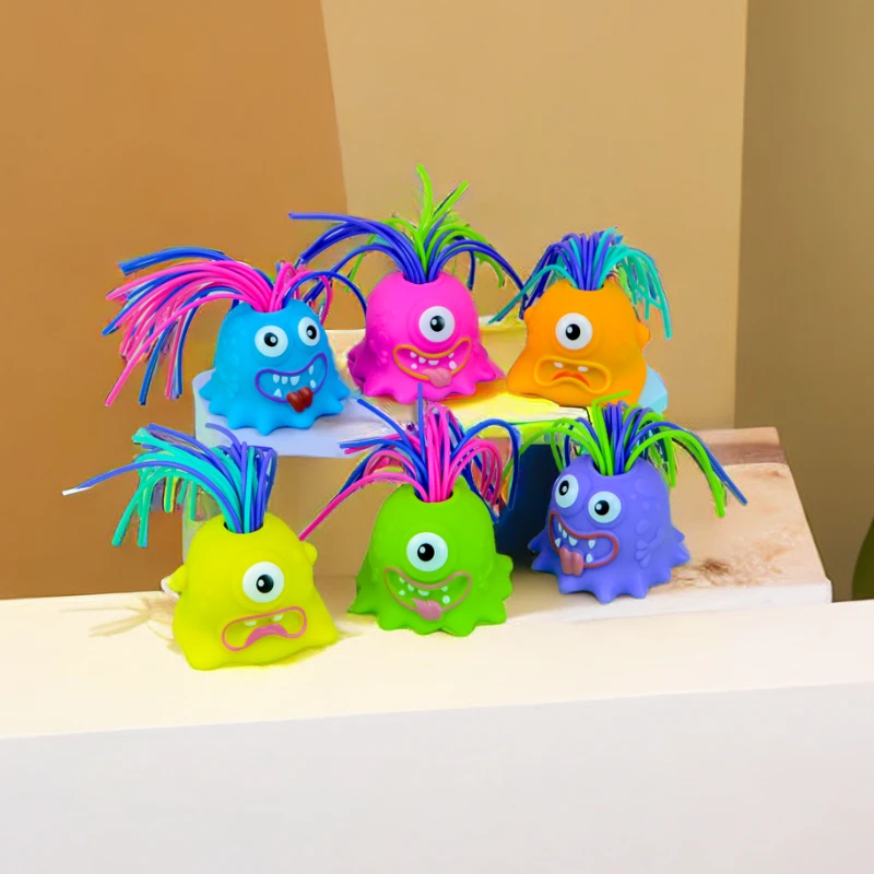 扯头发会叫小怪兽解压搞笑发泄恶搞大眼仔拔头发会尖叫的怪兽玩具