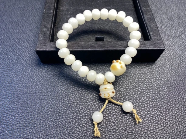 原生态白玉菩提根老型卡8*7手串，多样性发一