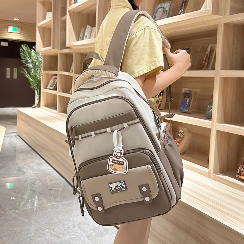 双肩包女2024新款百搭大容量初中生书包高中生大学生休闲森系背包