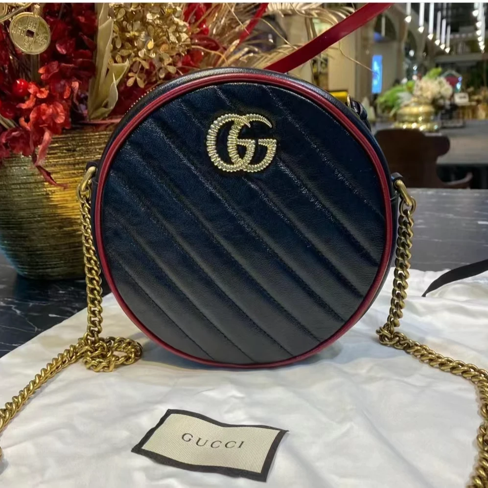 99新 GUCCI/古驰 古驰马蒙黑圆饼红边/包包