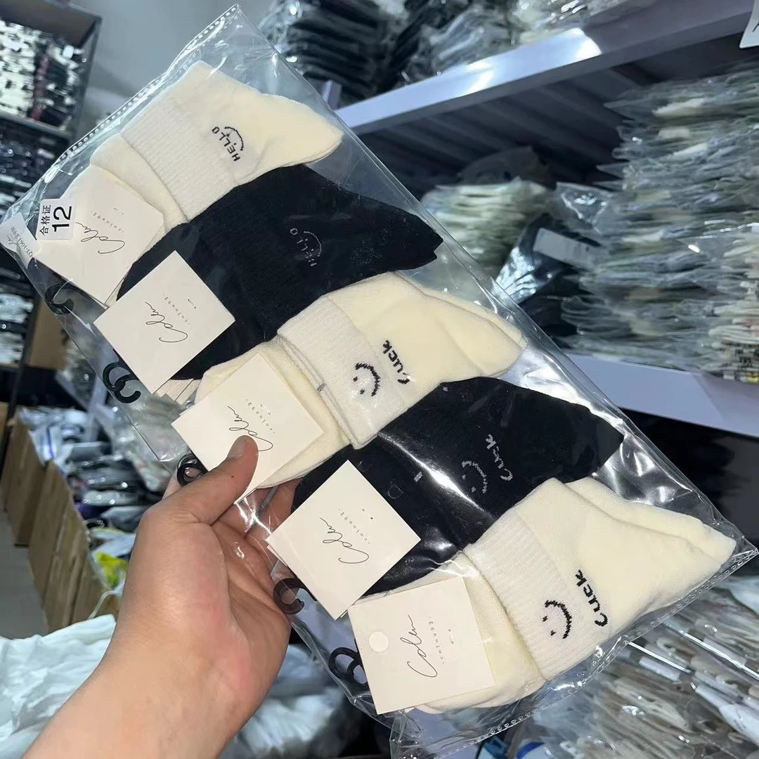 春秋款女士中筒网眼棉袜A084抗菌除臭透气好笑脸黑白颜色时尚百搭