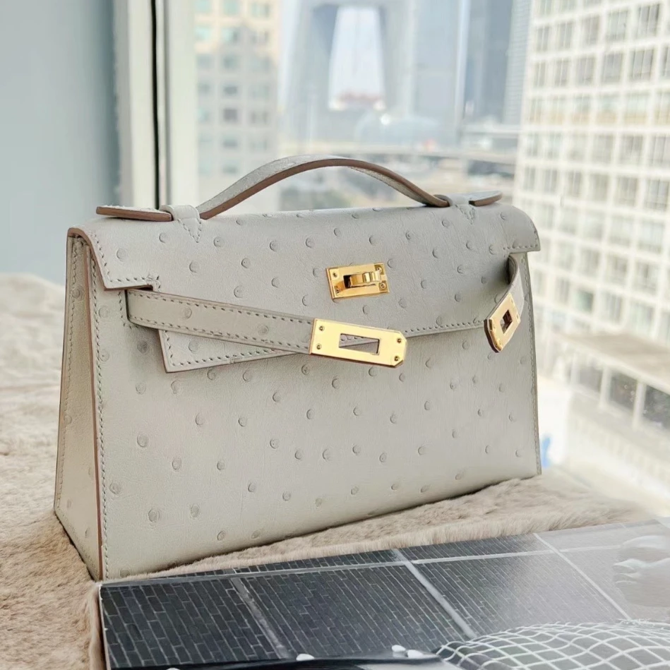 99新 Hermes/爱马仕 小花6珊 Kelly 一代 珍珠灰 鸵鸵 B刻 金扣宝