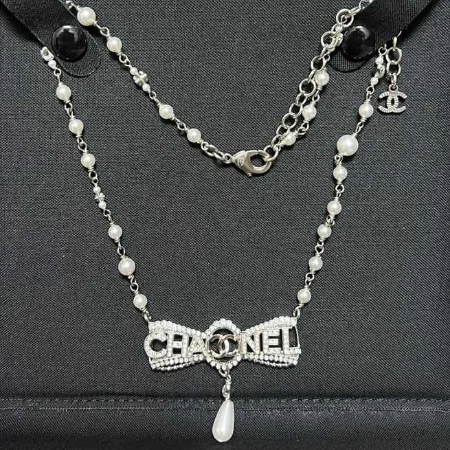 99新 Chanel/香奈儿 小花攀攀22B 蝴蝶结 水滴吊坠 项链 合金
