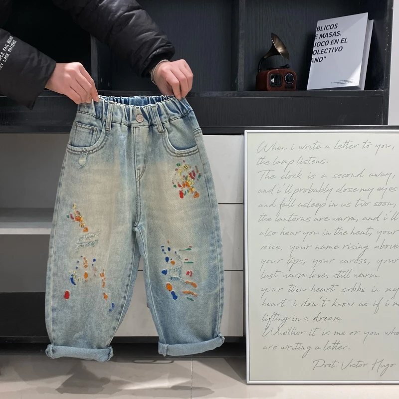 C101春季儿童新款破洞颜料盘牛仔裤