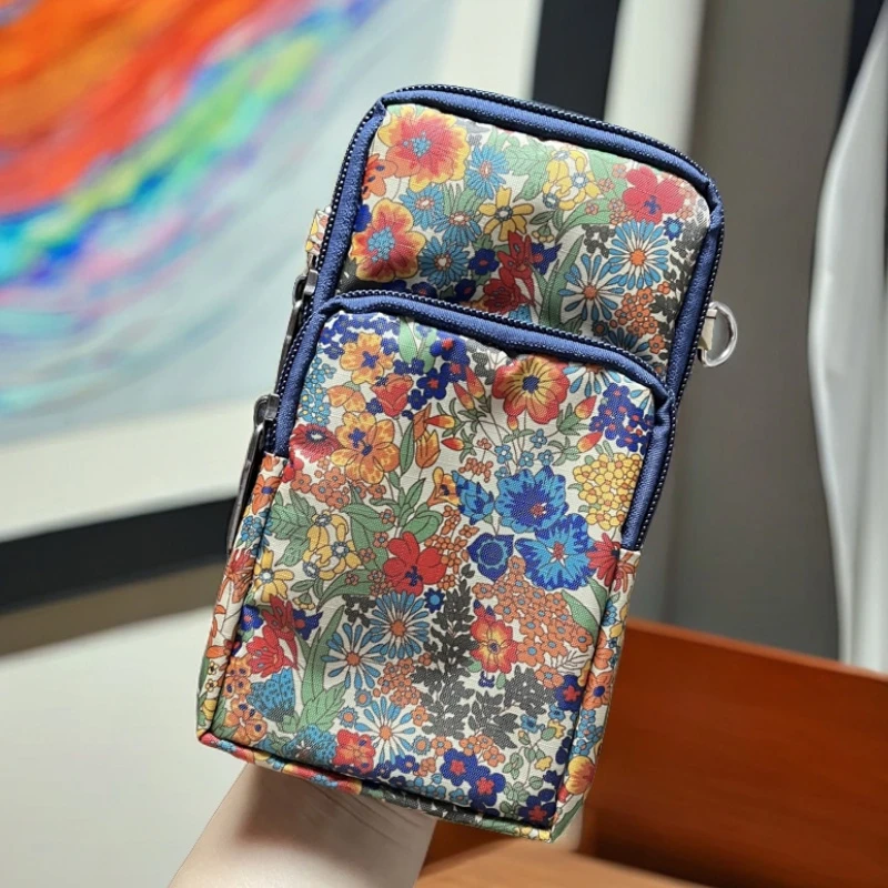 斜挎包女便携零钱包休闲手腕手机包斜挎百搭手拎包