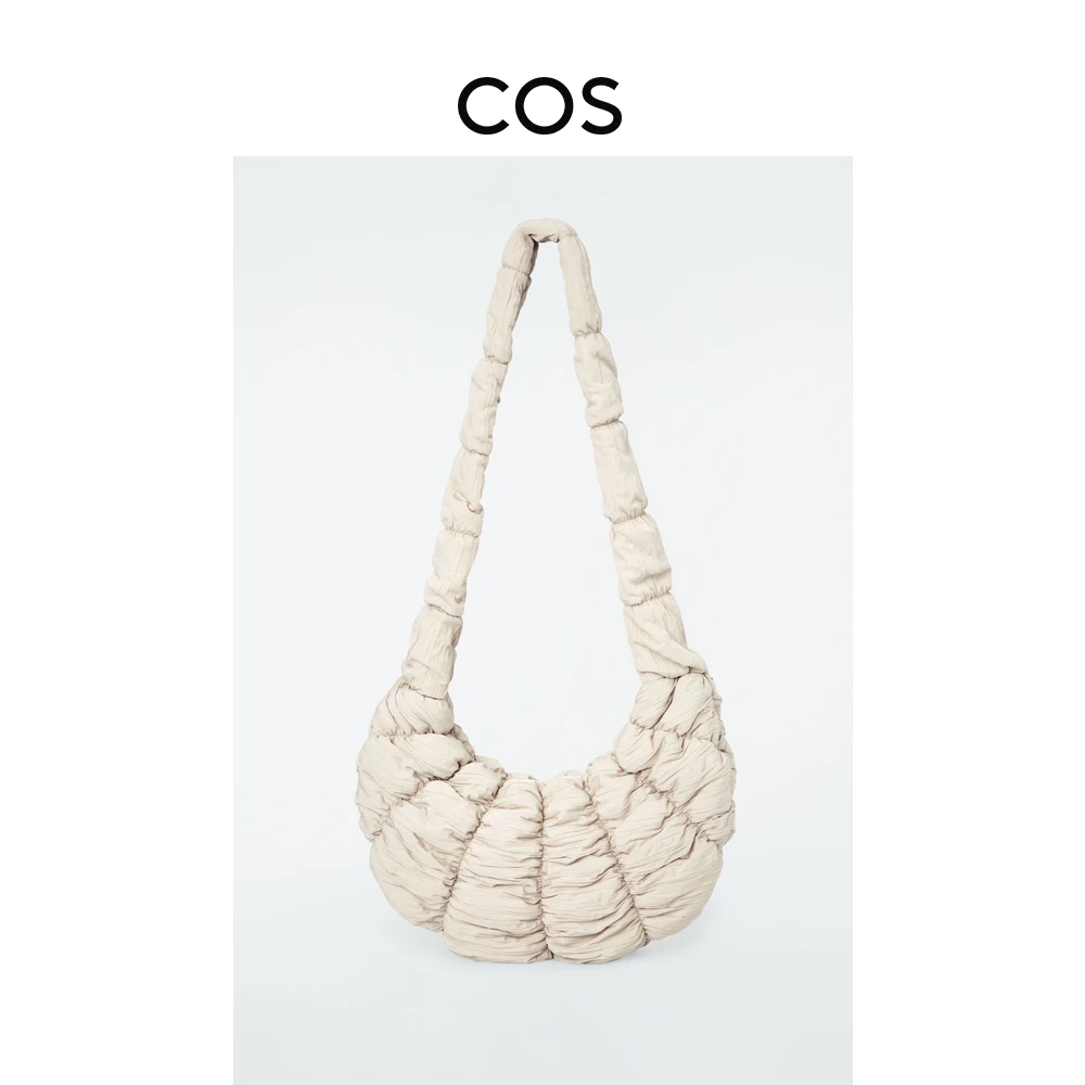 COS女士 轻质缩褶纹理月牙斜挎可颂包米色2024夏季新品1234770003