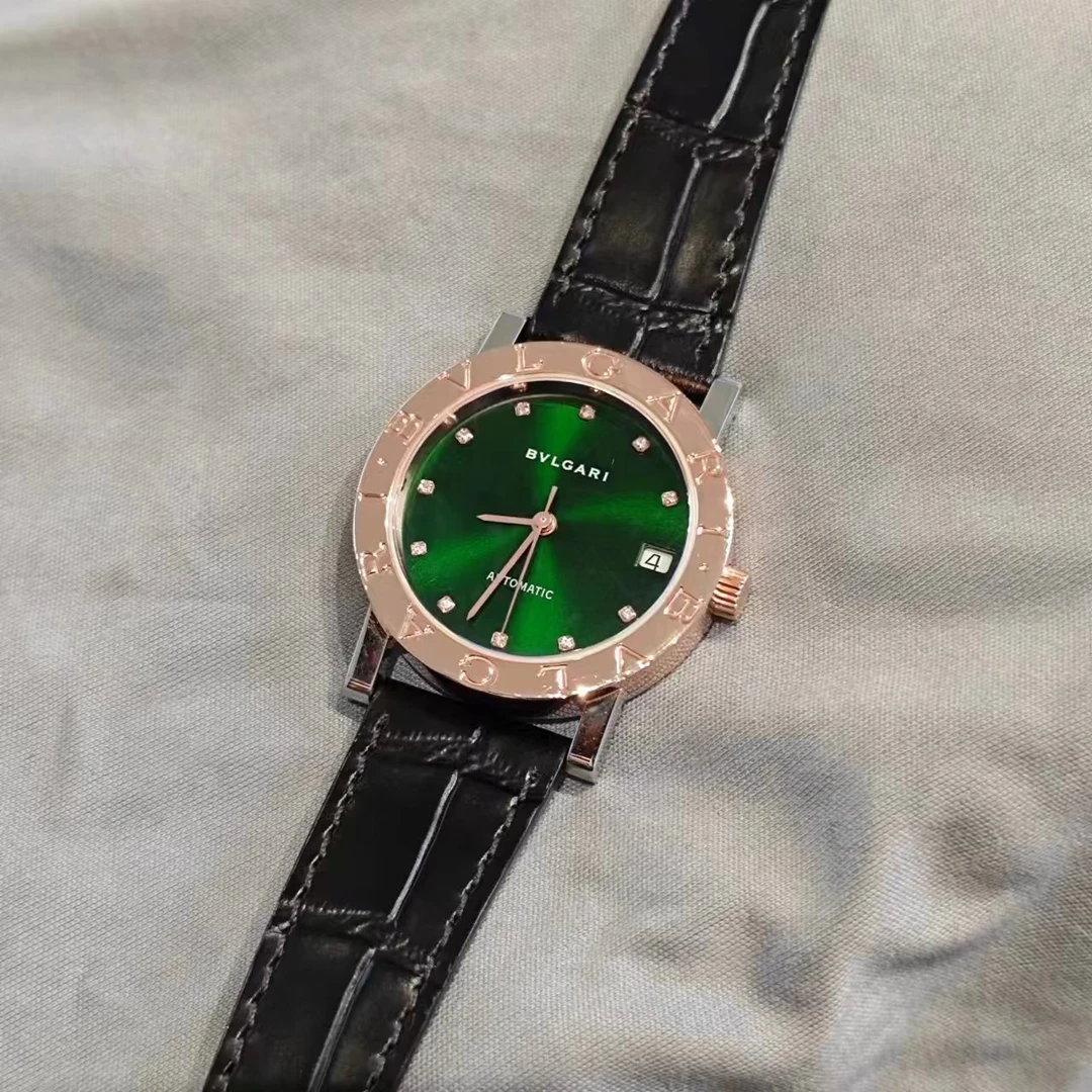 95新 BVLGARI/宝格丽 两针机械钻刻绿盘玫瑰金日历窗中古女表33盘