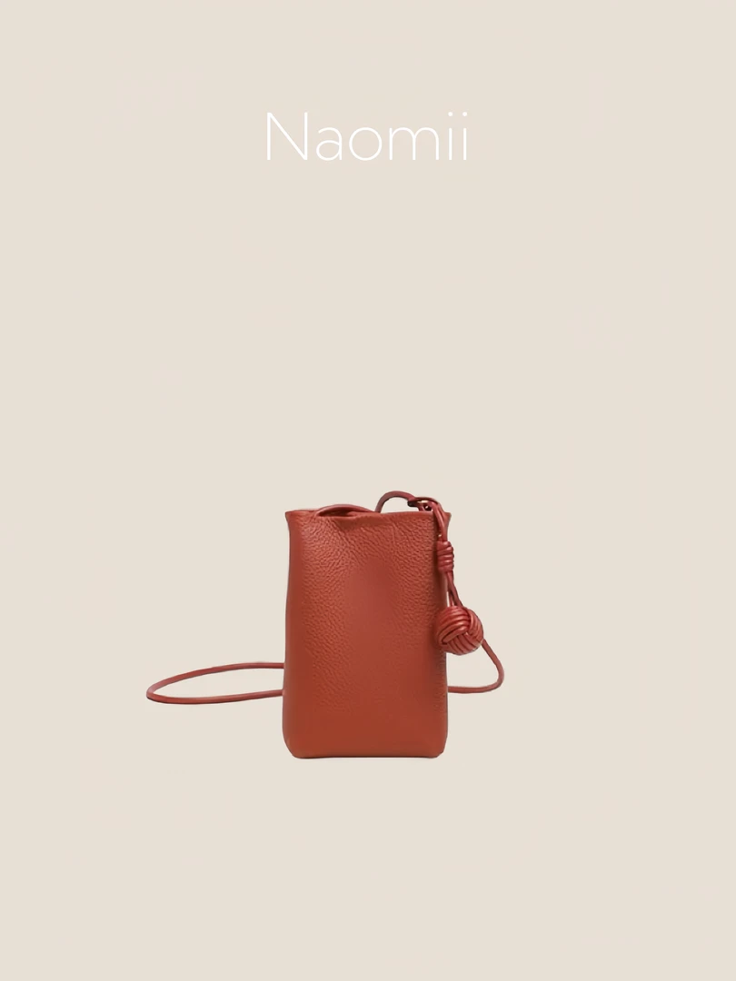 Naomii 首尔设计师系列真皮手机包女斜挎织球竖款软牛皮包迷你